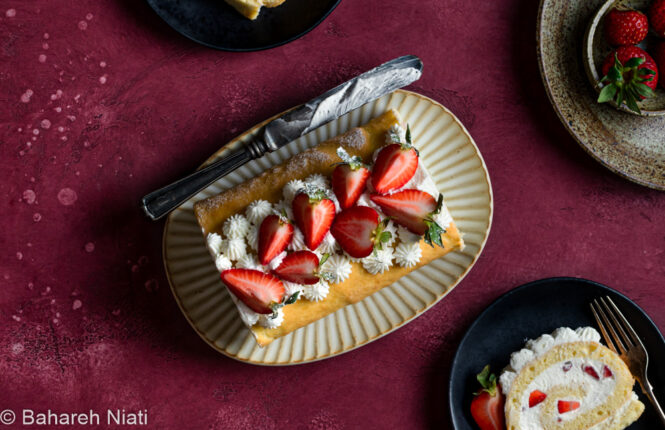 strawberry cake roll with whipped cream