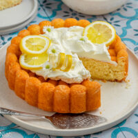 lemon cake with syrup and whipped cream