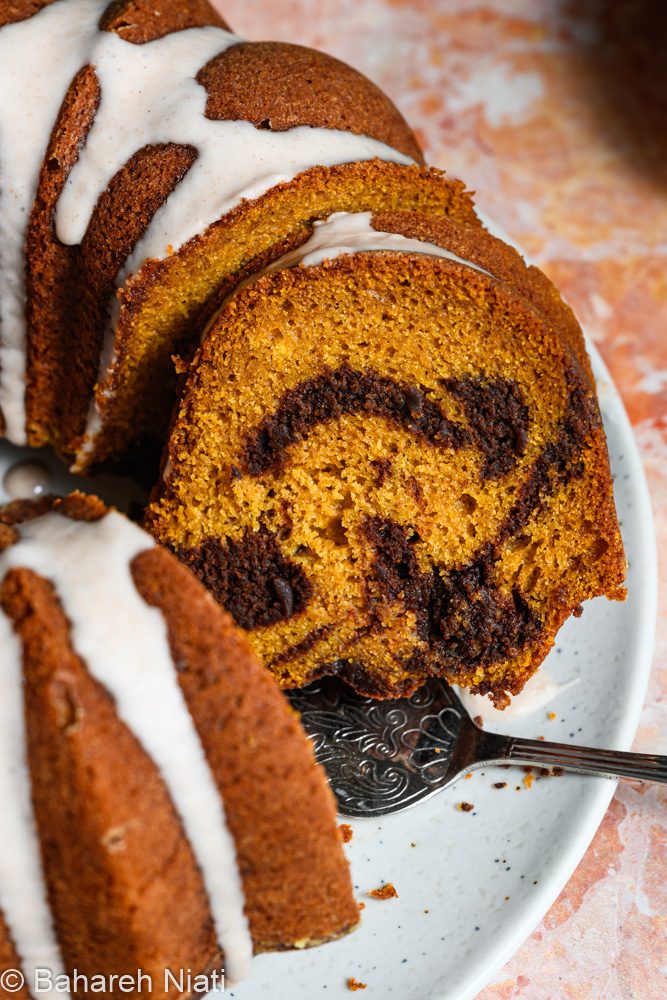 pumpkin chocolate marble cake with cinnamon glaze